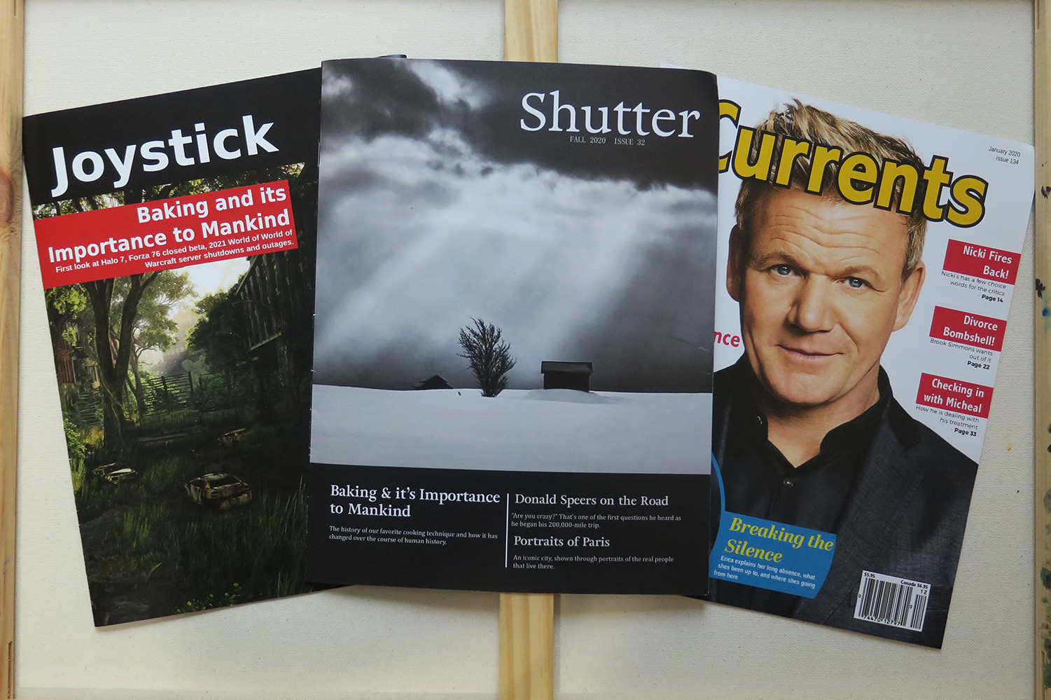 A gaming magazine titled 'Joystick', a photography magazine titled 'Shutter', and a celebrity news magazine titled 'Currents'.